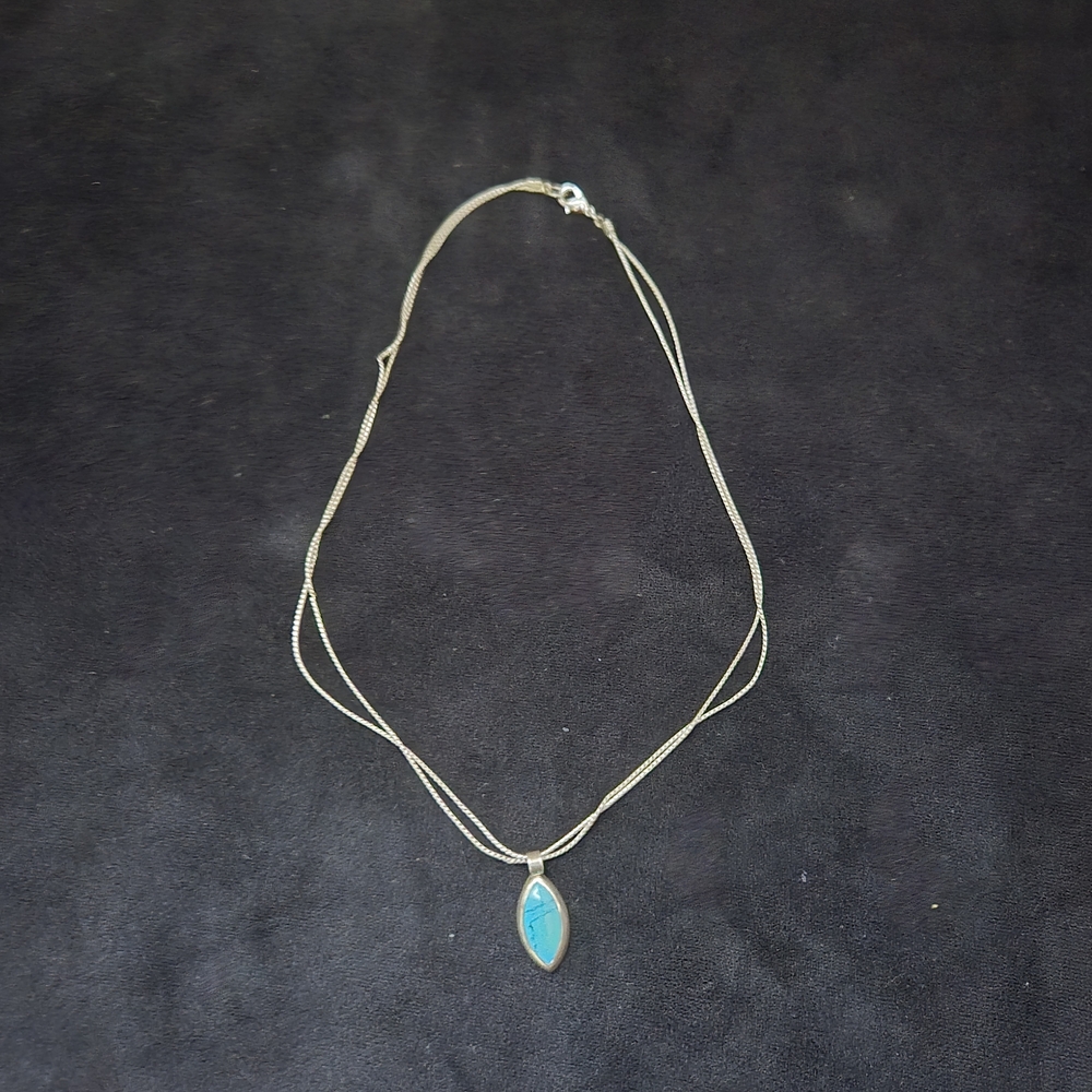 Elegant Silver Necklace with Blue Pendant